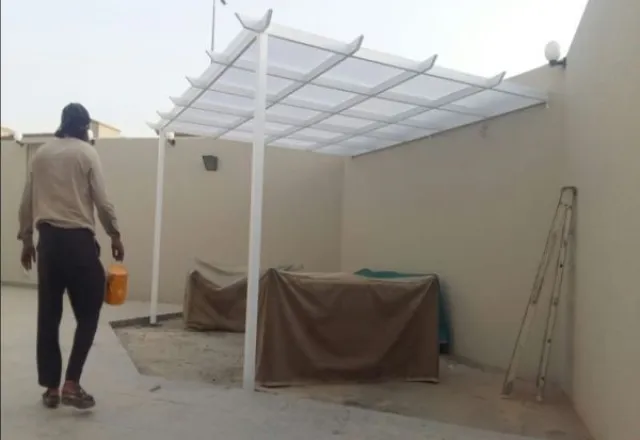 برجولة وتنسيق حديقة في حي النرجس